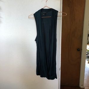 green draped tunic
